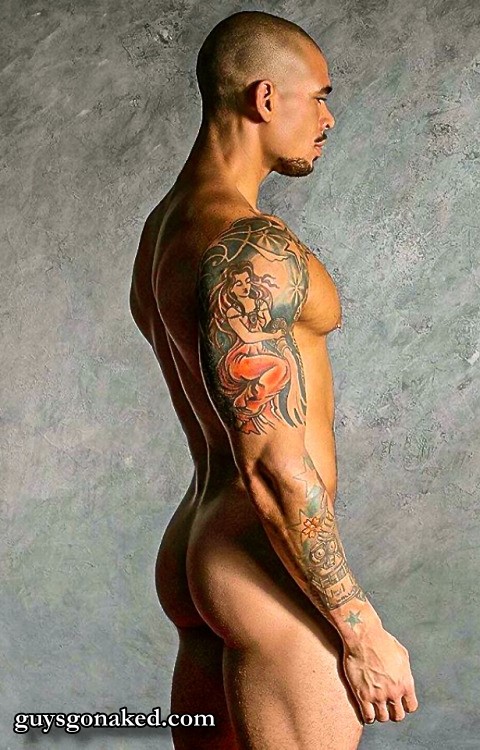 Tattoed guy naked